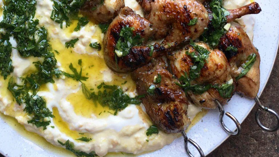 Hummus with Grilled Quail, Pomegranate Molasses and Parsley Salsa – An Ottolenghi-Inspired Delight - LemonSalt