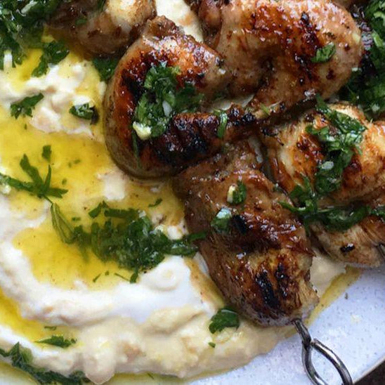 Hummus with Grilled Quail, Pomegranate Molasses and Parsley Salsa – An Ottolenghi-Inspired Delight - LemonSalt