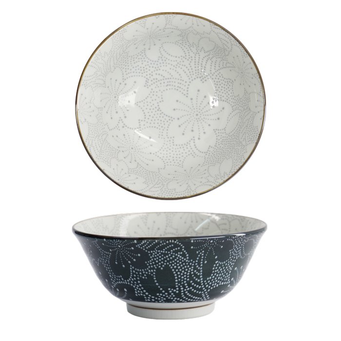 Ceramic bowl with dotted floral pattern, black exterior and white interior, kitchenware