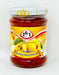 Glass jar of 1&1 Quince Jam 350g with yellow fruit label and German text on white background